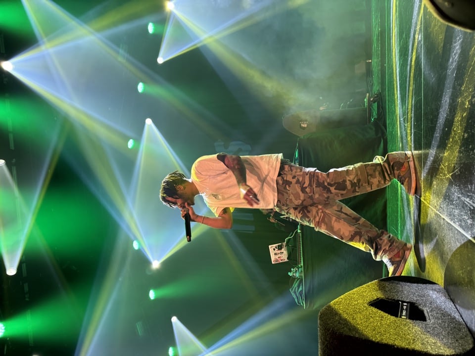 Kota The Friend performing on stage