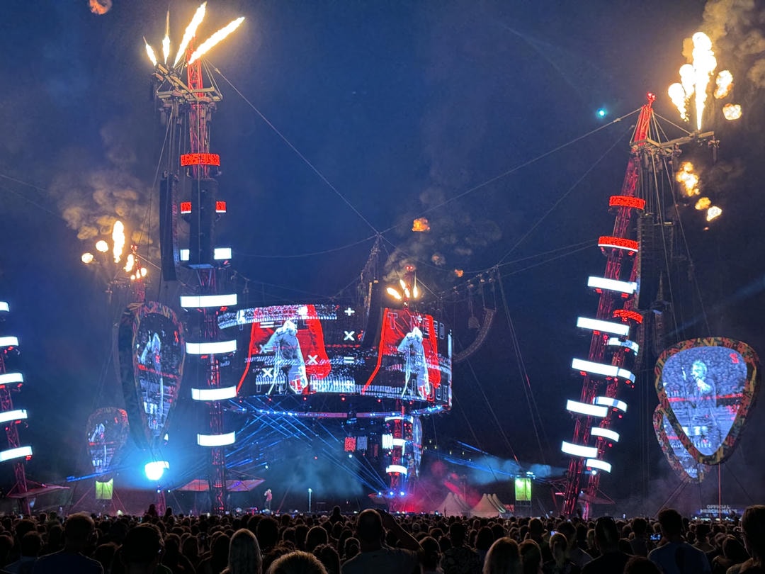 The stage of Ed Sheeran's "Mathematics" tour with pyrotechnics coming out of the top of it