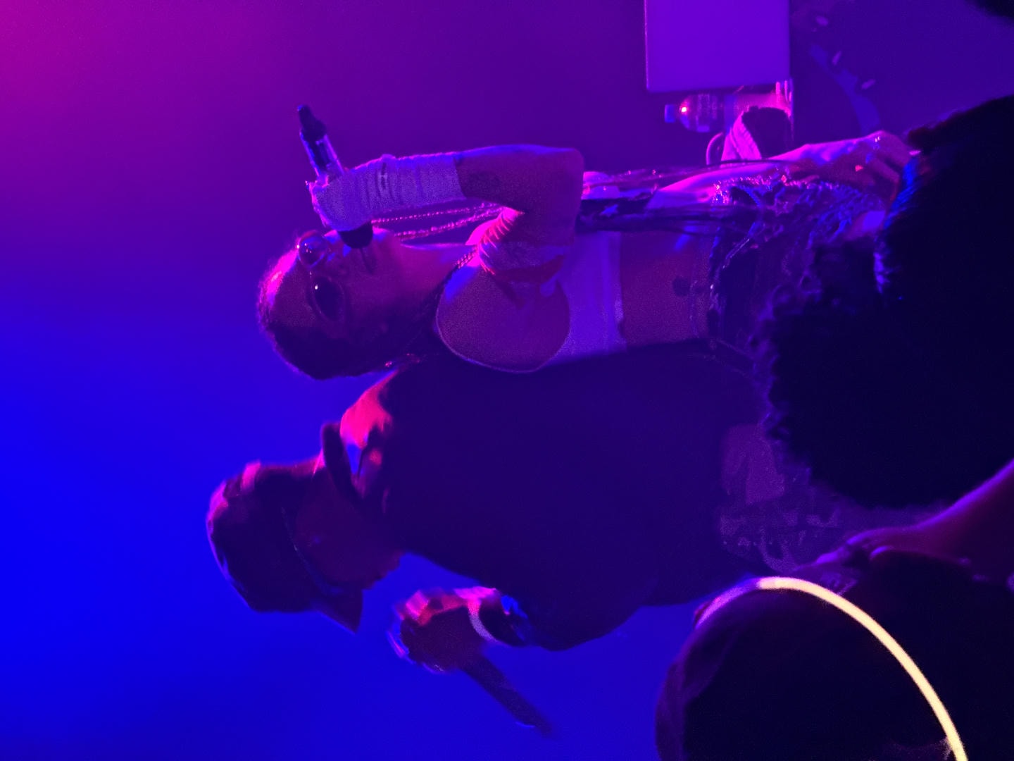 Jadagrace and SWIM back-to-back, performing live on stage.