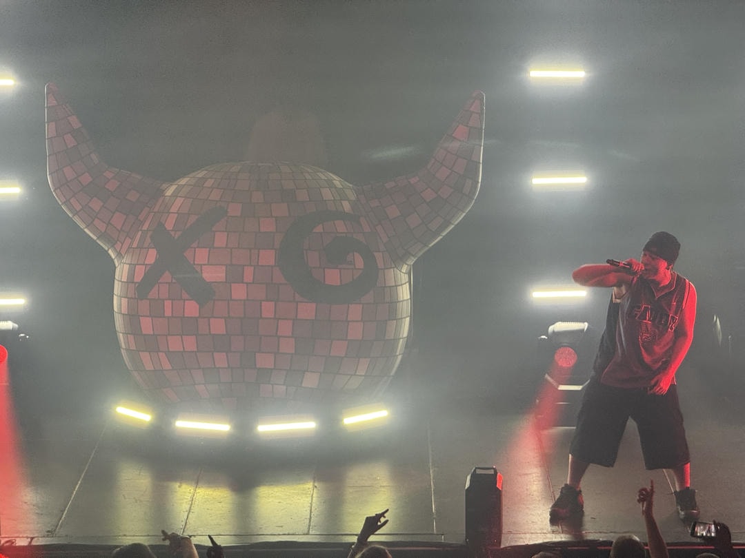 Brae seen performing live on stage.